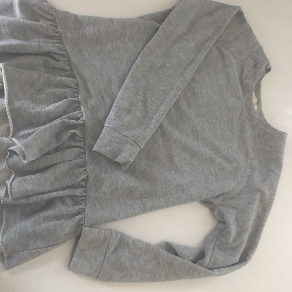 Ruffle hem sweatshirt